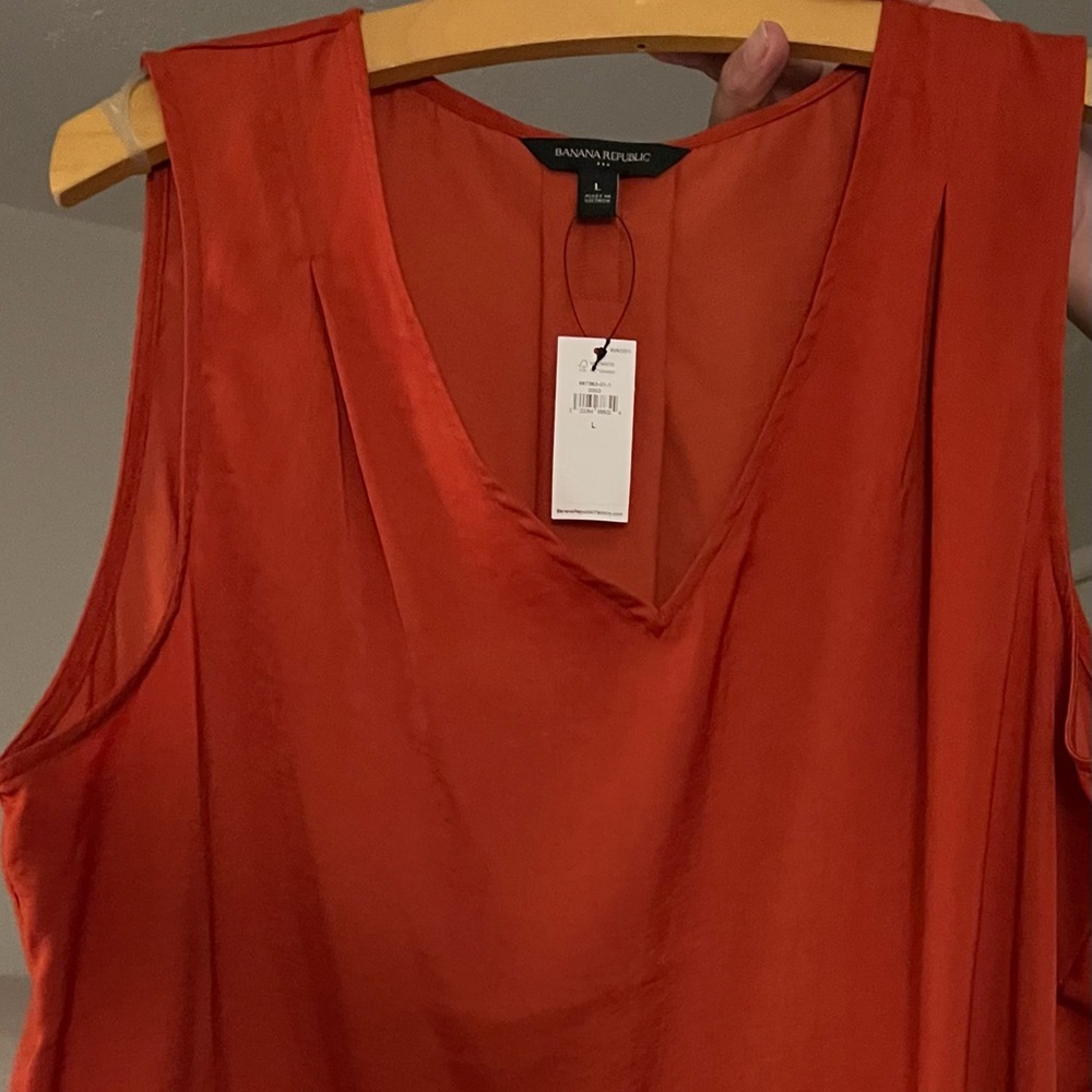 Banana Republic top. Gorgeous red orange color.
